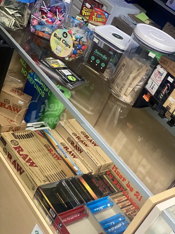 RAW cones, rolling papers, Boveda packs and bud clips at the Much Love counter