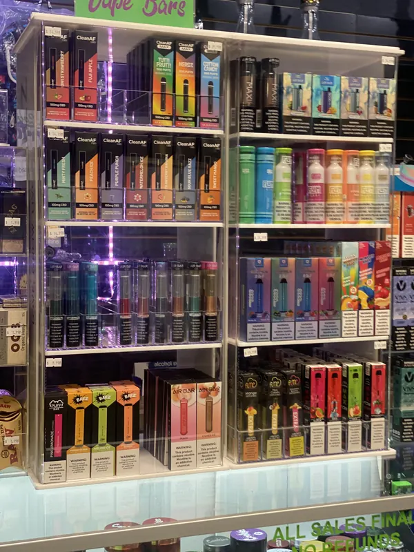 Floor-to-ceiling wall of disposable vapes